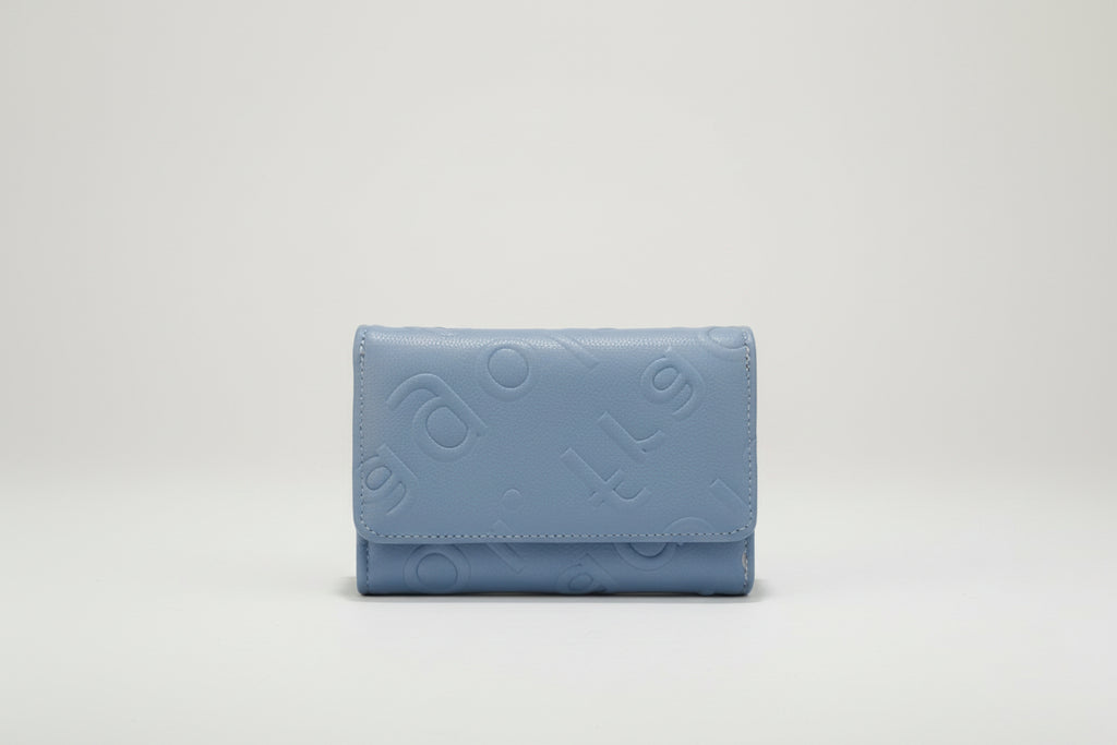 Light blue wallet on a white surface