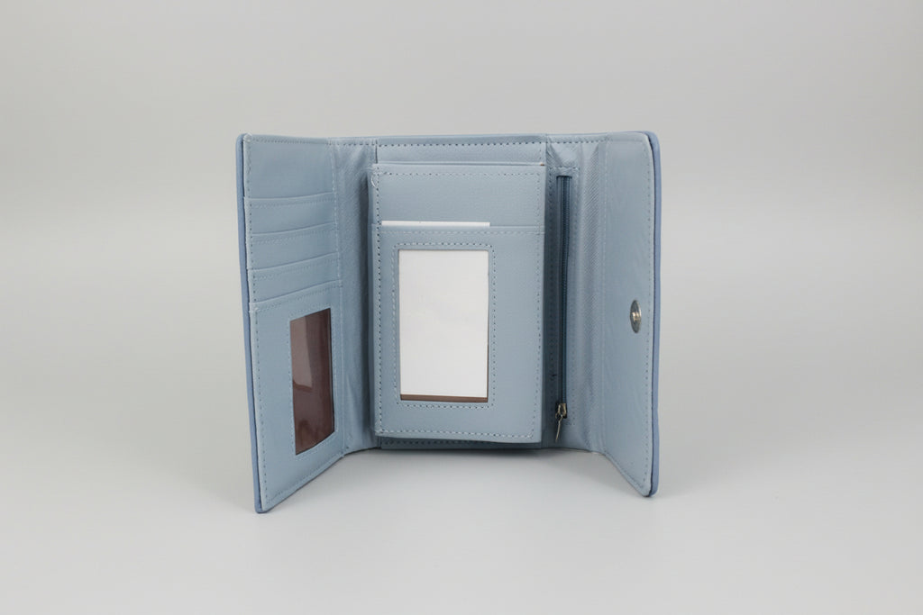 Blue wallet with a card holder on a white surface